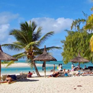 tourists relaxing in diani beach holiday packages