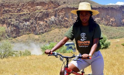lady cycling in hell's gate national park