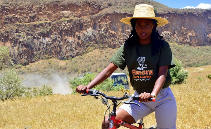 lady cycling in hell's gate national park