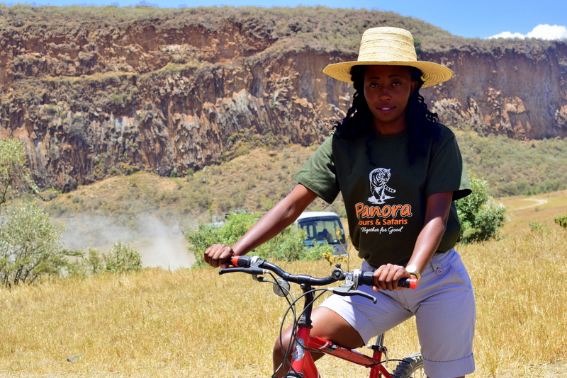 lady cycling in hell's gate national park