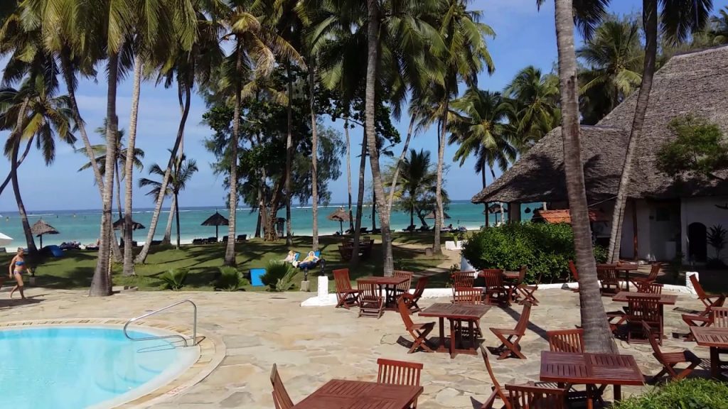 tourists relaxing at diani beach hotel